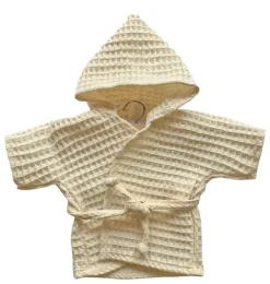 Ein Bademantel von Minikane. Entworfen und hergestellt für die Kollektion Baby